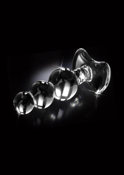 Hand-blown glass plug with tapered tip, graduated bulbs, and ergonomic base, perfect for anal play and temperature-responsive sensations.

Icicles No. 47 glass plug, hand-blown glass anal plug, luxury anal toy, hypoallergenic glass plug, graduated bulb anal plug, temperature play glass toy, elegant anal massager, nonporous glass butt plug, ergonomic anal toy, dishwasher-safe anal plug