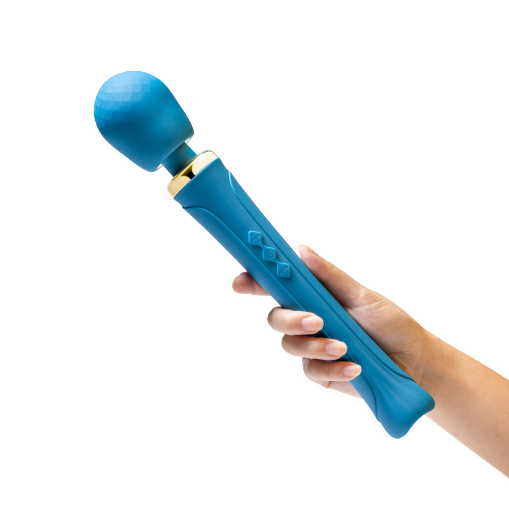 Teal wand massager with flexible silicone head, 20 RumboTech™ vibration modes, and waterproof design for full-body relaxation.

Keywords: wand massager, Dianna wand, RumboTech wand, personal massager, flexible head, waterproof wand, USB rechargeable, 20 vibration modes, body-safe silicone, satin smooth, self-care massager, luxury massager, full-body wand