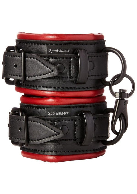 Sportsheets Saffron Cuffs in bright scarlet vegan leather with soft inner lining, adjustable straps, and durable design for BDSM play