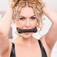 Saffron Silicone Bit Gag with adjustable vegan leather strap, designed for comfort and secure BDSM play. Keywords: Saffron silicone bit gag, vegan leather bit gag, BDSM gag, bondage gag, silicone gag for BDSM, adjustable bit gag, Sportsheets gag, BDSM accessories, vegan leather bondage gear, comfortable BDSM gag, kink gag for couples.