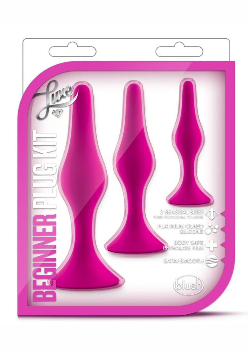 Luxe Beginner Plug Kit in Pink: Satin-smooth silicone, body-safe design, and three graduated sizes make this perfect for anal play beginners. Features tapered tips, suction cup bases, and easy-clean material.