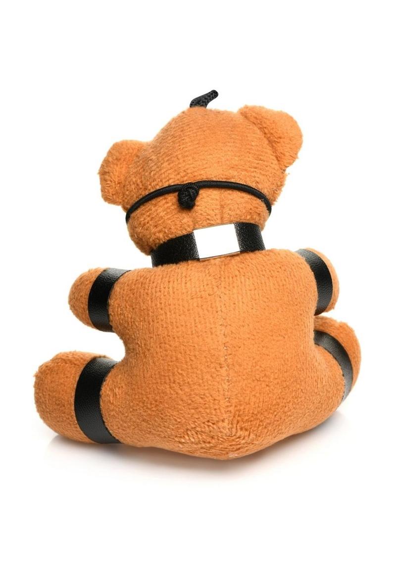 Burnt orange teddy bear keychain with cuffs, chains, and a ball gag, perfect as a gag gift or fun accessory.

gagged teddy bear keychain, BDSM bear keychain, gag gift kinky bear, bondage bear accessory, gagged teddy bag charm, quirky gag gifts, BDSM flagging keychain, teddy bear bondage toy, kinky novelty bear, bondage-themed accessories