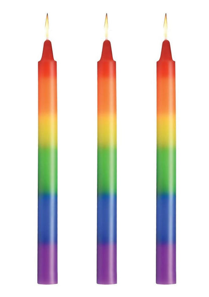 Set of three unscented rainbow drip candles designed for wax play, featuring vibrant layers of color for temperature sensation and artistic body art.

