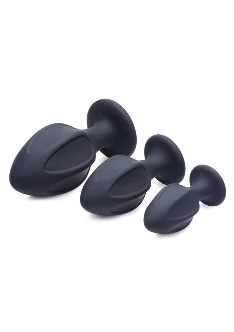 Master Series Triple Juicers: Three star-shaped silicone plugs with suction bases, perfect for anal training. Graduated sizes ensure pleasure for every skill level.