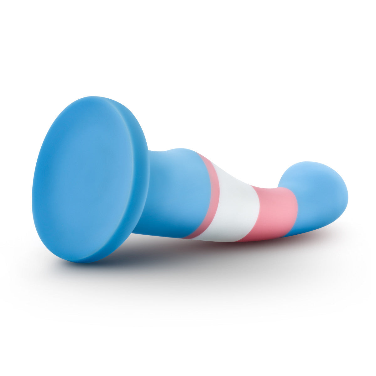 Trans pride flag-colored silicone dildo with a curved shaft, suction base, and smooth finish for G-spot or P-spot stimulation. Keywords: trans pride dildo, Avant dildo, G-spot dildo, P-spot dildo, suction cup dildo, harness-compatible dildo, body-safe silicone dildo, Purio silicone, colorful pride dildo, artisan-crafted dildo.