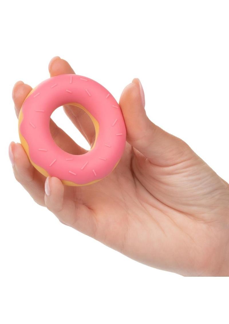 Naughty Bits Dickin' Donuts Silicone Donut Cock Ring
Pink silicone donut-shaped cock ring for enhanced stamina, sensitivity, and erection support, part of the Naughty Bits collection.
Keywords: silicone cock ring, donut-shaped cock ring, Naughty Bits collection, pink penis ring, waterproof cock ring, phthalate-free cock ring, erection support ring, playful cock ring, stamina-enhancing ring.