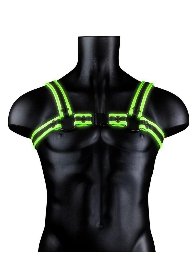 Glow-in-the-dark adjustable bondage harness with fluorescent green detailing. Keywords: Ouch Glow in the Dark Harness, glow-in-the-dark bondage harness, fluorescent green harness, adjustable BDSM harness, glow bondage gear, glow-in-the-dark fetish wear, party bondage accessories, men’s harness, glow kink gear, neon bondage harness.