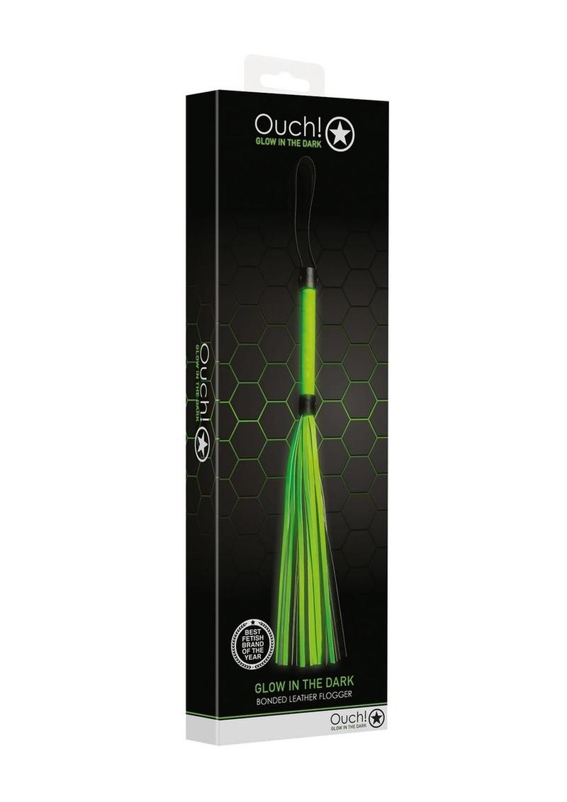 Ouch! Flogger - Black/Glow In The Dark/Green Glow-in-the-dark BDSM flogger with a sturdy handle and fluorescent green detailing. Keywords: Ouch Glow in the Dark BDSM Flogger, glow-in-the-dark flogger, fluorescent green BDSM whip, glow bondage gear, beginner BDSM flogger, glow-in-the-dark fetish whip, BDSM impact toy, neon bondage flogger, BDSM glow gear, flogger for kinky play.