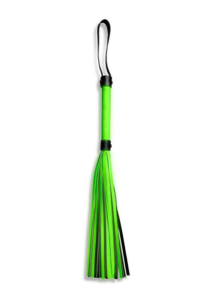 Ouch! Flogger - Black/Glow In The Dark/Green Glow-in-the-dark BDSM flogger with a sturdy handle and fluorescent green detailing. Keywords: Ouch Glow in the Dark BDSM Flogger, glow-in-the-dark flogger, fluorescent green BDSM whip, glow bondage gear, beginner BDSM flogger, glow-in-the-dark fetish whip, BDSM impact toy, neon bondage flogger, BDSM glow gear, flogger for kinky play.