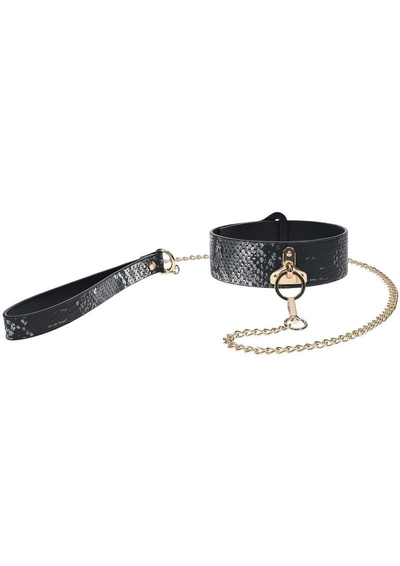 Ouch! Florence Collection Collar with Leash - Black Florence Collection Collar and Leash by Ouch! featuring bonded leather and iridescent hardware, designed for stylish control and comfort