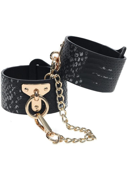 Ouch! Florence Collection Handcuffs - Black Florence Collection handcuffs by Ouch! crafted from bonded leather hand cuffs with iridescent hardware, combining high fashion and secure functionality.