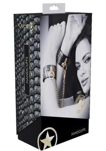 Florence Collection handcuffs by Ouch! crafted from bonded leather hand cuffs with iridescent hardware, combining high fashion and secure functionality.