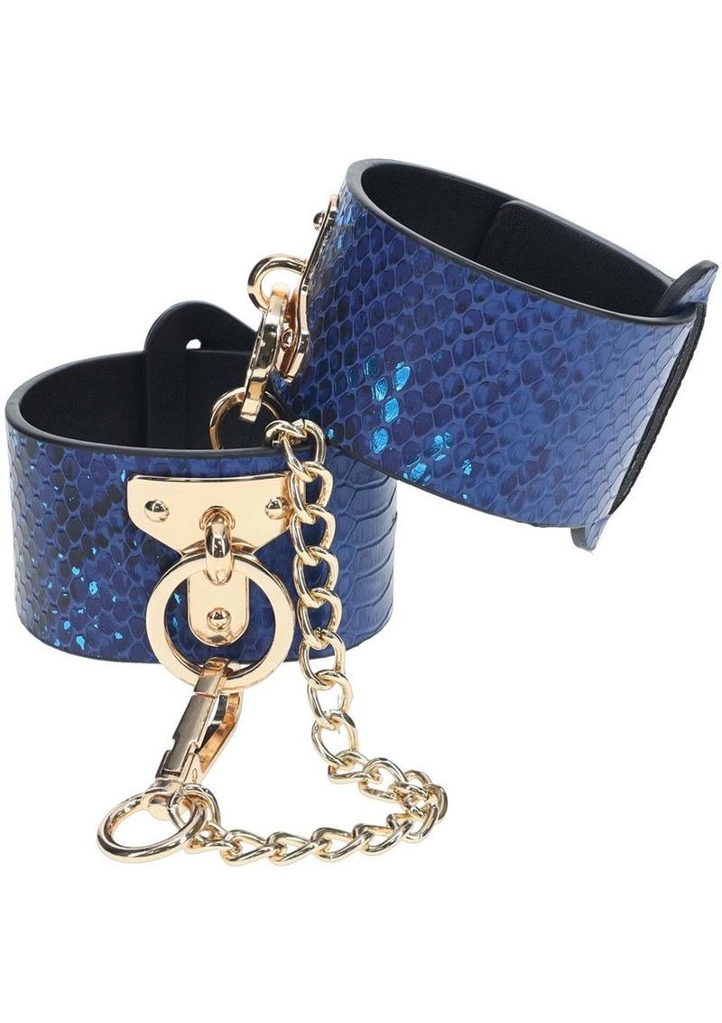 Ouch! Florence Collection Handcuffs - Blue Florence Collection handcuffs by Ouch! crafted from bonded leather hand cuffs with iridescent hardware, combining high fashion and secure functionality.