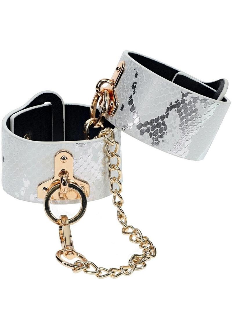 Florence Collection handcuffs by Ouch! crafted from bonded leather hand cuffs with iridescent hardware, combining high fashion and secure functionality.