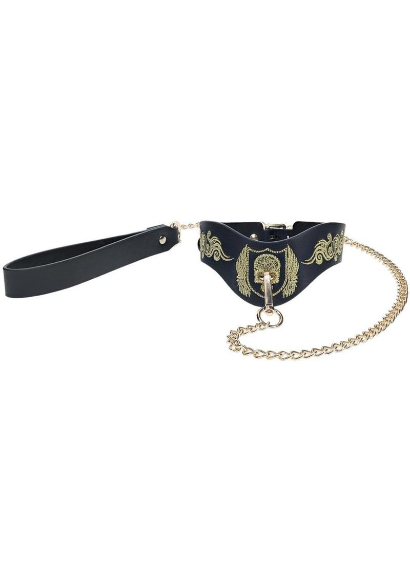 London Collection Collar and Leash by Ouch! featuring bonded leather, gold embroidered skull-and-wings motif, and a sleek gold chain leash for BDSM or roleplay