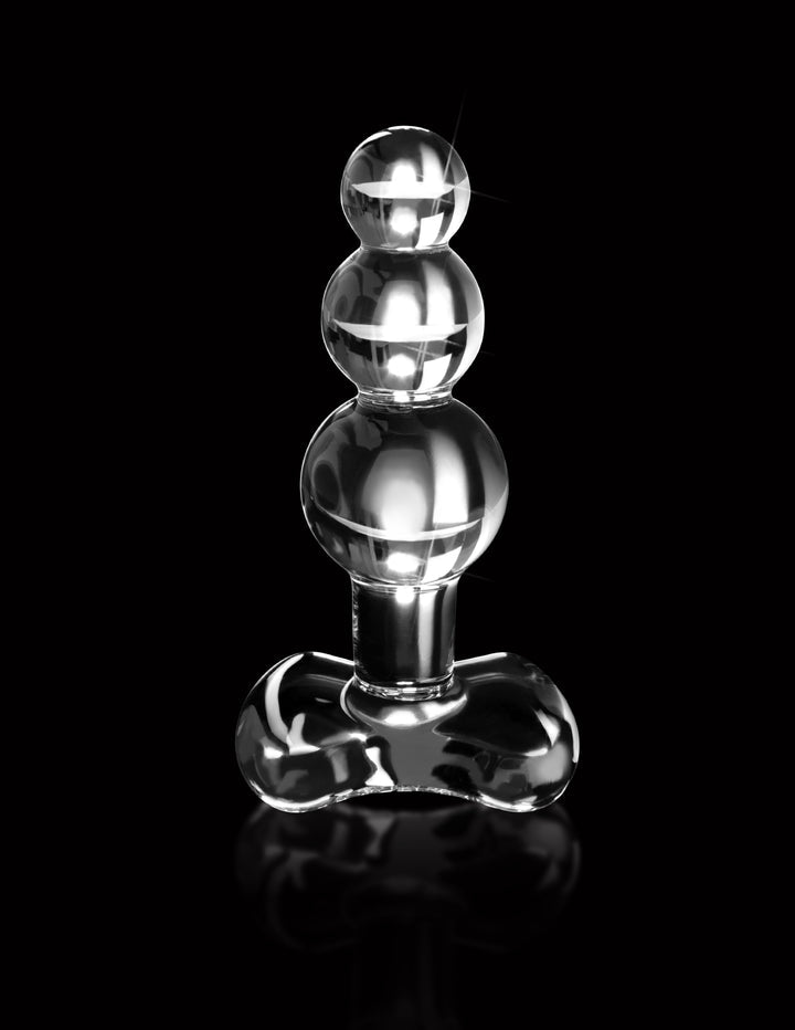 Hand-blown glass plug with tapered tip, graduated bulbs, and ergonomic base, perfect for anal play and temperature-responsive sensations.

Icicles No. 47 glass plug, hand-blown glass anal plug, luxury anal toy, hypoallergenic glass plug, graduated bulb anal plug, temperature play glass toy, elegant anal massager, nonporous glass butt plug, ergonomic anal toy, dishwasher-safe anal plug