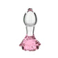 Pink rose-shaped glass anal plug with a tapered stem and elegant base for temperature play and luxurious anal stimulation. Keywords: glass anal plug, pink rose anal plug, luxurious anal toy, borosilicate glass plug, elegant anal stimulation, temperature play toy, beginner-friendly anal plug, body-safe anal plug, easy-to-clean glass toy, PowerBullet anal plug.