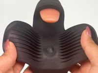 A sleek black penis stimulator with 10 tongue-teasing modes, pulsating shaft stimulation, and a ribbed taco wrap design. USB rechargeable and crafted from body-safe silicone. Keywords: vibrating penis stimulator, M For Men Lickety Split, tongue-teasing toy, pulsating vibration, ribbed wrap design, USB rechargeable stimulator, body-safe silicone, edging toy, male vibrator, black penis stimulator, customizable stimulation