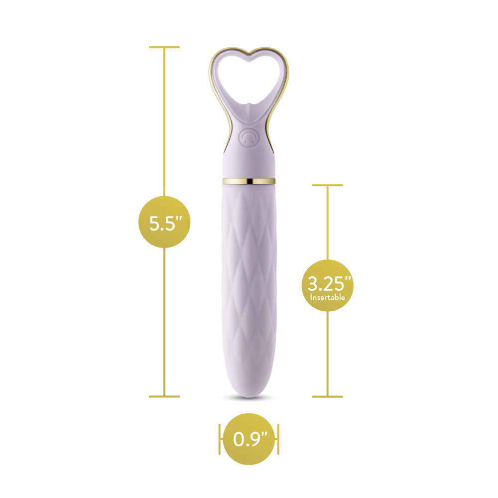 A chic, heart-shaped vibrator with 10 vibration modes, a tapered tip, and a gold-accented handle. Made from soft silicone, it’s splashproof, USB rechargeable, and compact for travel. 
Keywords: Delice vibrator, heart-shaped handle, chic vibrator, Puria silicone, UltraSilk finish, splashproof vibrator, USB rechargeable, travel-friendly vibrator, 10 vibration modes, compact vibrator, body-safe silicone, giftable vibrator