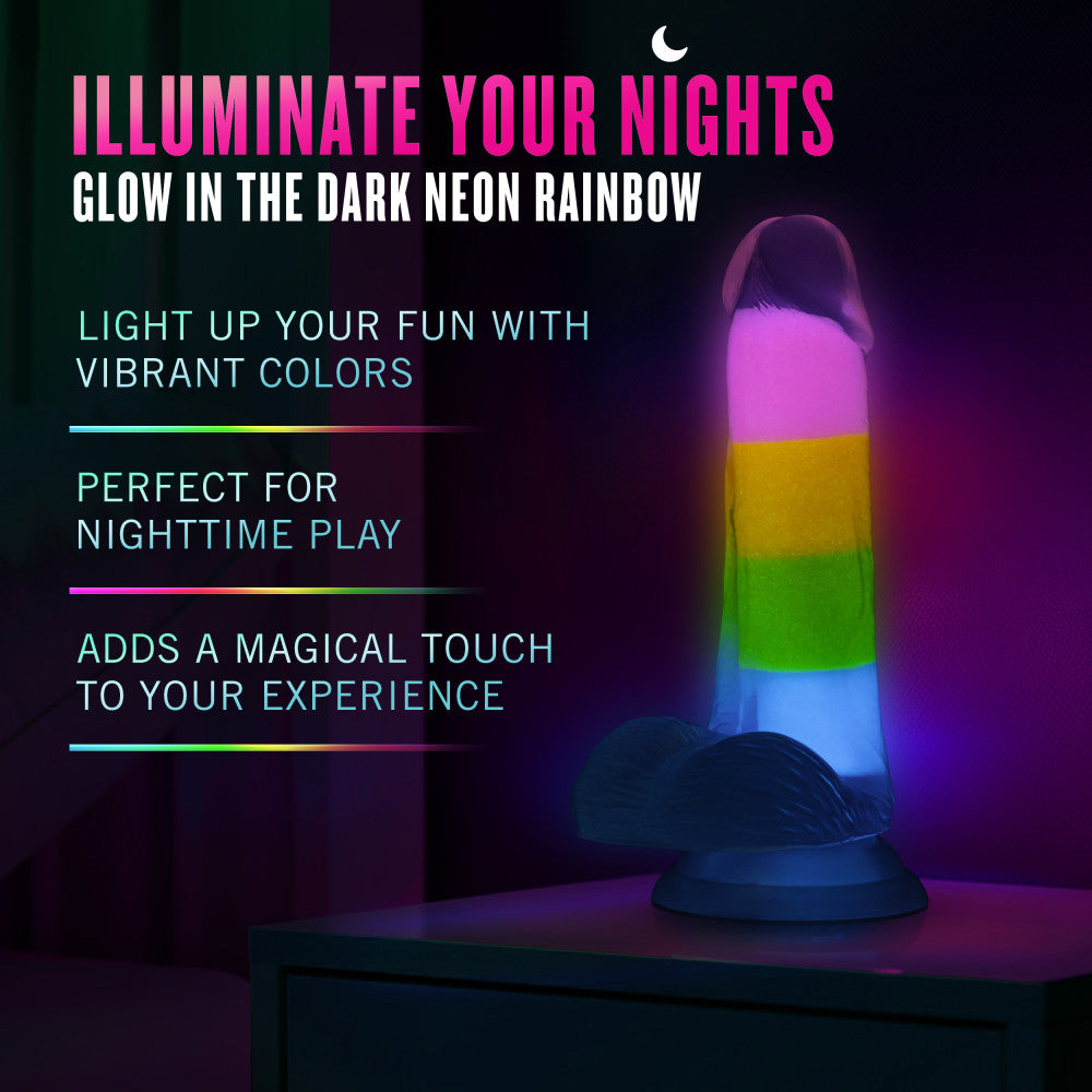 A vibrant glow-in-the-dark rainbow dildo with dual-density silicone, a suction cup base, and lifelike details. Perfect for hands-free or strap-on play. Keywords: Neo Elite Rainbow Rave, glow-in-the-dark dildo, rainbow dildo, Sensa Feel, dual-density silicone, Purio silicone, harness-compatible dildo, suction cup dildo, body-safe silicone, lifelike dildo, beginner-friendly toy 