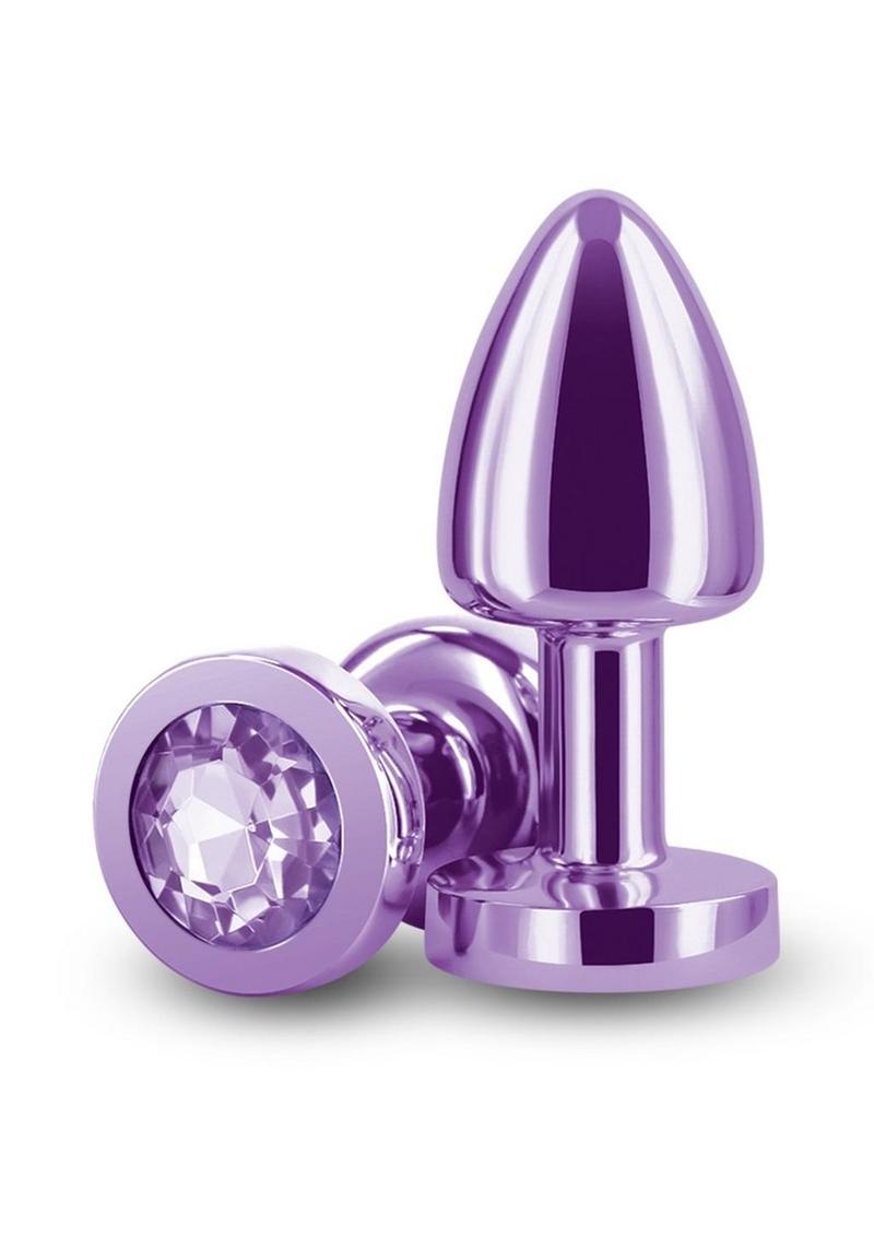 Rear Assets Aluminum Anal Plug - Petite - Metal/Purple - XSmall A collection of Rear Assets chrome-plated anal plugs in a variety of colors, each featuring a jeweled base for added visual appeal.