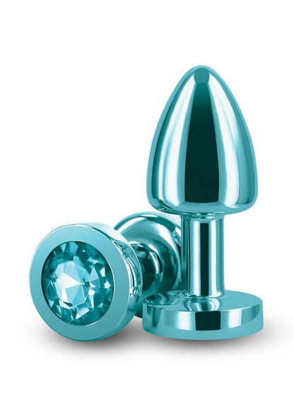 Rear Assets Aluminum Anal Plug - Petite - Metal/Teal - XSmall A collection of Rear Assets chrome-plated anal plugs in a variety of colors, each featuring a jeweled base for added visual appeal.