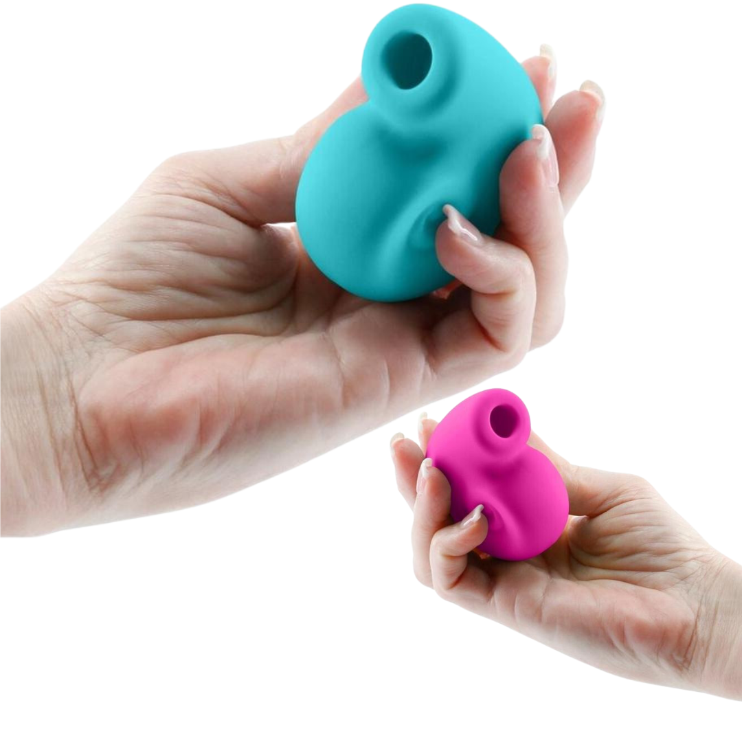 Revel Starlet Air Pulse Vibrators in teal and pink, featuring a compact snail shell-inspired design and a smooth silicone finish. Designed for lifelike suction stimulation with Air Pulse Technology.