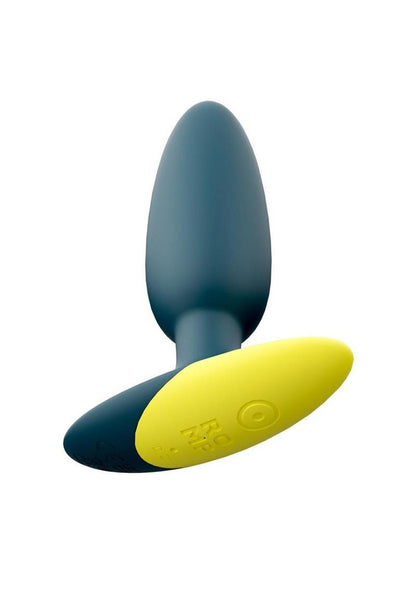 Close-up of the ROMP Bass Vibrating Anal Plug in teal with a yellow accent on the base. The plug has a sleek, tapered design crafted from smooth, body-safe silicone for comfortable insertion and use.