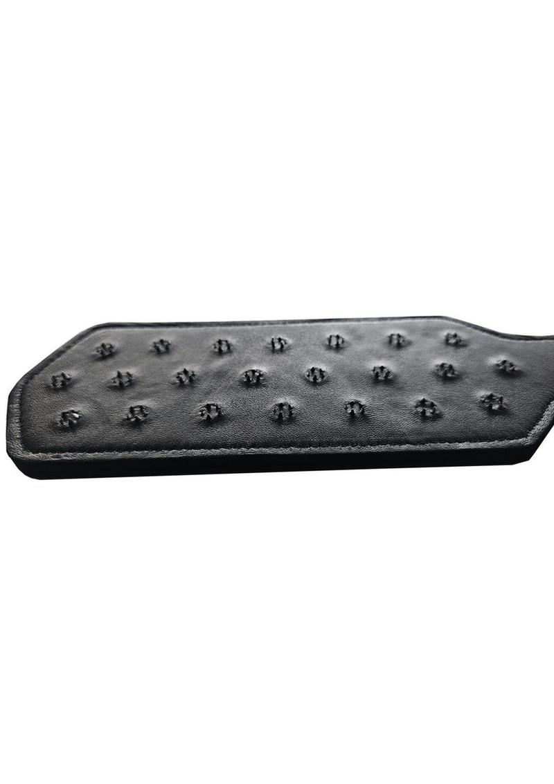 Black leather paddle with metal spikes for advanced BDSM impact play. Keywords: pinprick paddle, BDSM paddle, spiked paddle, leather impact paddle, advanced impact play, BDSM tools, extreme BDSM paddle, metal spike paddle, handcrafted leather paddle, intense BDSM play, vampire glove 