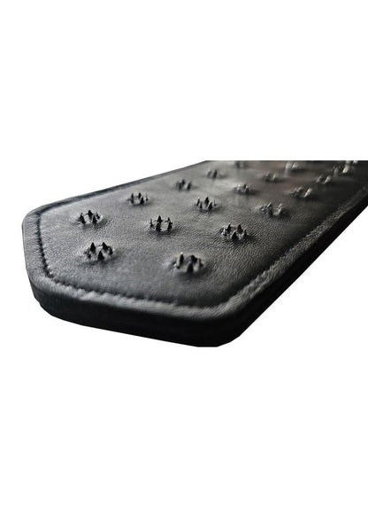 Black leather paddle with metal spikes for advanced BDSM impact play. Keywords: pinprick paddle, BDSM paddle, spiked paddle, leather impact paddle, advanced impact play, BDSM tools, extreme BDSM paddle, metal spike paddle, handcrafted leather paddle, intense BDSM play, vampire glove 