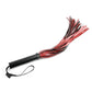 Saffron Flogger - Black/Red Sportsheets Saffron Flogger with black and saffron faux leather falls, durable metal handle, and hanging loop for stylish BDSM play