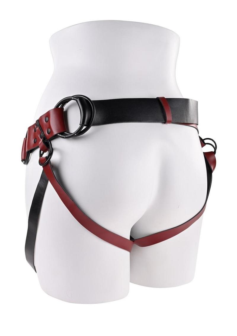 Saffron Monte Strap-On Harness - Black/Red Saffron Monte Strap-On in scarlet faux leather with adjustable harness and O-ring compatibility. Keywords: Saffron Monte Strap-On, adjustable strap-on harness, scarlet faux leather harness, Sportsheets strap-on, interchangeable O-ring strap-on, 3-way harness with scrotum clearance, bold strap-on harness, beginner strap-on, BDSM harness, strap-on for couples.