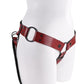 Saffron Monte Strap-On Harness - Black/Red Saffron Monte Strap-On in scarlet faux leather with adjustable harness and O-ring compatibility. Keywords: Saffron Monte Strap-On, adjustable strap-on harness, scarlet faux leather harness, Sportsheets strap-on, interchangeable O-ring strap-on, 3-way harness with scrotum clearance, bold strap-on harness, beginner strap-on, BDSM harness, strap-on for couples.