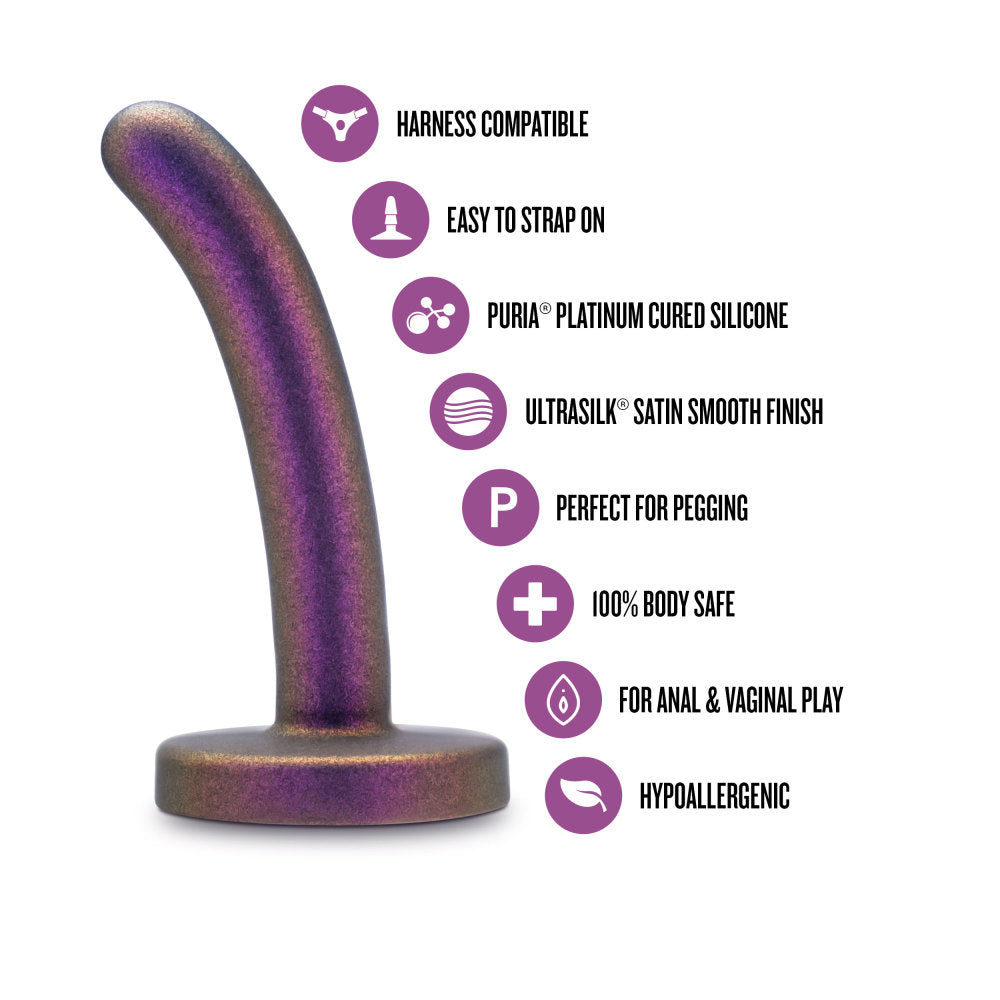 A shimmering purple strap-on-compatible dildo with a curved design, made from body-safe silicone for comfortable, beginner-friendly play.
Keywords: Temptasia Surrender Peg, beginner pegging dildo, harness compatible, Puria silicone dildo, UltraSilk finish, G-spot stimulation, strap-on play, purple dildo, body-safe silicone, slim dildo, beginner-friendly dildo