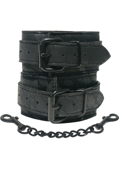 Luxurious lace cuffs with black buckles, nickel-free D-rings, and a 12-inch chain for elegant restraint play.