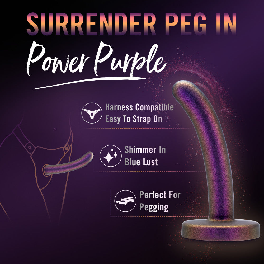 A shimmering purple strap-on-compatible dildo with a curved design, made from body-safe silicone for comfortable, beginner-friendly play.
Keywords: Temptasia Surrender Peg, beginner pegging dildo, harness compatible, Puria silicone dildo, UltraSilk finish, G-spot stimulation, strap-on play, purple dildo, body-safe silicone, slim dildo, beginner-friendly dildo