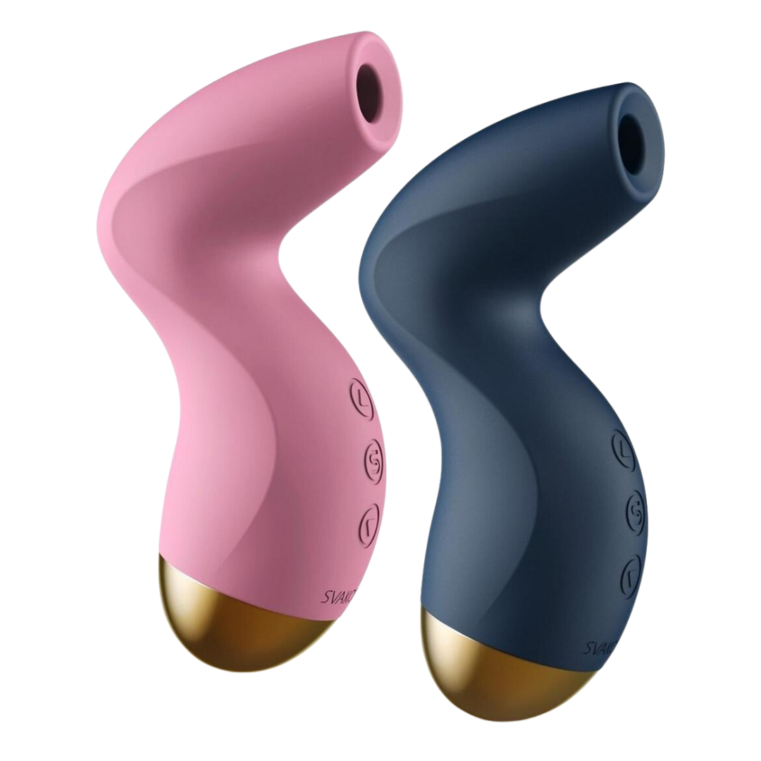 Two SVAKOM Pulse Pure clitoral stimulators in pink and navy blue, featuring a sleek, curvaceous design with a gold accent base and ergonomic shape for easy handling.