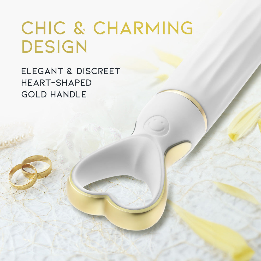 A chic, heart-shaped vibrator with 10 vibration modes, a tapered tip, and a gold-accented handle. Made from soft silicone, it’s splashproof, USB rechargeable, and compact for travel. 
Keywords: Delice vibrator, heart-shaped handle, chic vibrator, Puria silicone, UltraSilk finish, splashproof vibrator, USB rechargeable, travel-friendly vibrator, 10 vibration modes, compact vibrator, body-safe silicone, giftable vibrator