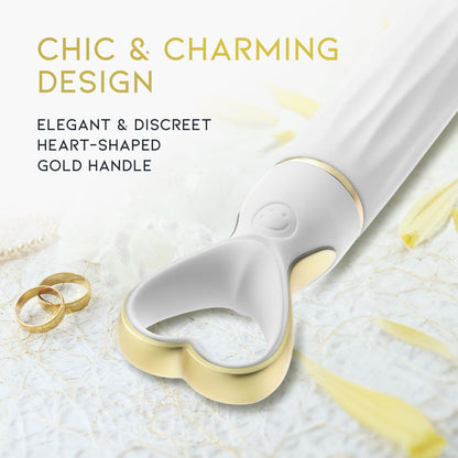 A chic, heart-shaped vibrator with 10 vibration modes, a tapered tip, and a gold-accented handle. Made from soft silicone, it’s splashproof, USB rechargeable, and compact for travel. 
Keywords: Delice vibrator, heart-shaped handle, chic vibrator, Puria silicone, UltraSilk finish, splashproof vibrator, USB rechargeable, travel-friendly vibrator, 10 vibration modes, compact vibrator, body-safe silicone, giftable vibrator