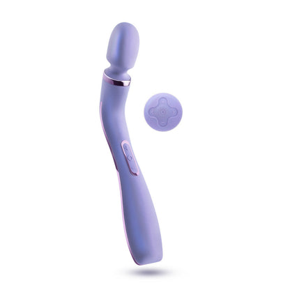 Purple ergonomic massage wand featuring RumbleTech™ vibrations, long handle, and smooth silicone design with a remote control.Keywords: massage wand, RumbleTech wand, ergonomic vibrator, lavender wand, remote control vibrator, waterproof wand, Puria silicone wand, self-care massage wand, rechargeable vibrator, deep tissue massage wand.