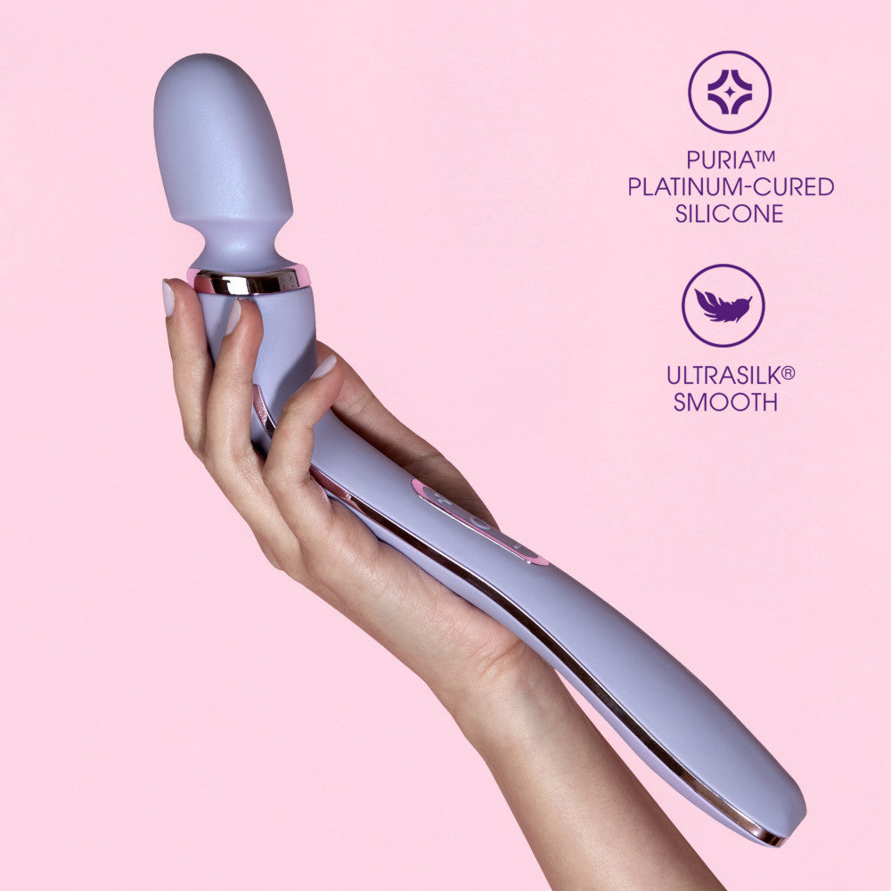 Purple ergonomic massage wand featuring RumbleTech™ vibrations, long handle, and smooth silicone design with a remote control.Keywords: massage wand, RumbleTech wand, ergonomic vibrator, lavender wand, remote control vibrator, waterproof wand, Puria silicone wand, self-care massage wand, rechargeable vibrator, deep tissue massage wand.