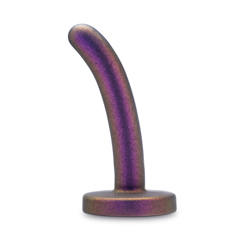 A shimmering purple strap-on-compatible dildo with a curved design, made from body-safe silicone for comfortable, beginner-friendly play.
Keywords: Temptasia Surrender Peg, beginner pegging dildo, harness compatible, Puria silicone dildo, UltraSilk finish, G-spot stimulation, strap-on play, purple dildo, body-safe silicone, slim dildo, beginner-friendly dildo