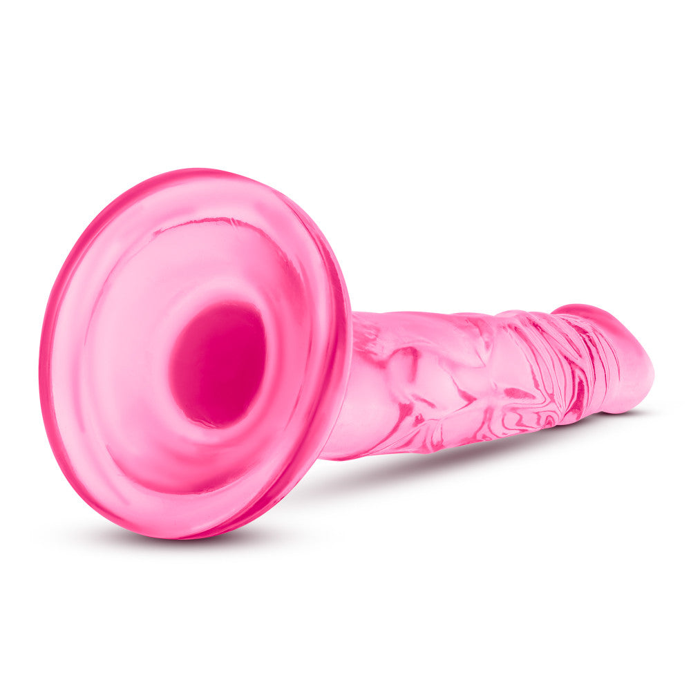 Naturally Yours 5 Inch Mini Cock, slim lifelike dildo with suction cup base and harness compatibility, available in pink or purple.

slim dildo, beginner-friendly dildo, pink dildo, purple dildo, harness-compatible toy, suction cup base, body-safe TPE, pegging dildo, realistic slim dildo, beginner anal toy