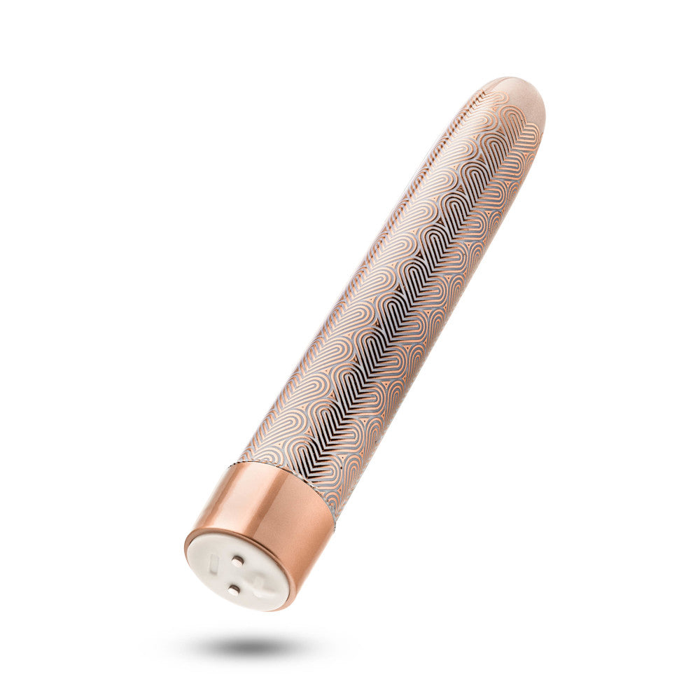 Rose gold slimline vibrator with an elegant design featuring RumbleTech™ deep vibrations, USB charging, and waterproof functionality.
Keywords: slimline vibrator, rose gold vibrator, RumbleTech vibrator, USB rechargeable vibrator, waterproof vibrator, body-safe sex toy, customizable vibrator, luxury vibrator, elegant sex toy, bath-friendly vibrator