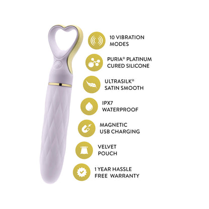 A chic, heart-shaped vibrator with 10 vibration modes, a tapered tip, and a gold-accented handle. Made from soft silicone, it’s splashproof, USB rechargeable, and compact for travel. 
Keywords: Delice vibrator, heart-shaped handle, chic vibrator, Puria silicone, UltraSilk finish, splashproof vibrator, USB rechargeable, travel-friendly vibrator, 10 vibration modes, compact vibrator, body-safe silicone, giftable vibrator