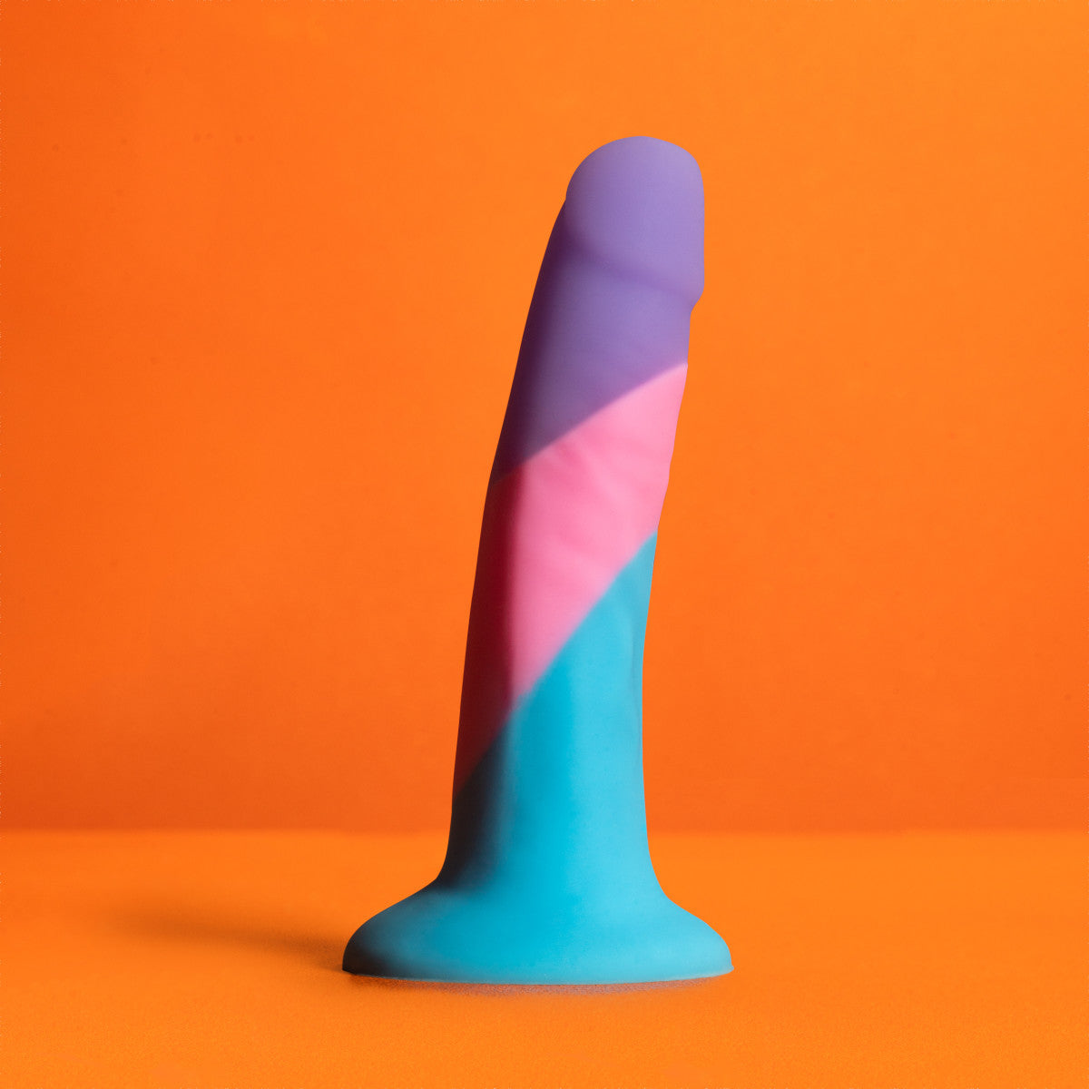 Petite multi-colored silicone dildo with a smooth finish, suction base, and slim design for beginners or anal play.
Keywords: petite dildo, Avant dildo, slim dildo, beginner-friendly dildo, anal play dildo, body-safe silicone dildo, suction cup dildo, harness-compatible dildo, colorful silicone toy, Purio silicone.