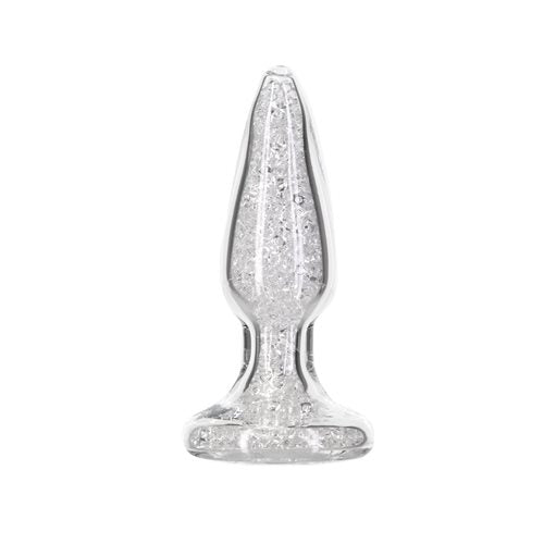 Luxurious, safe, and easy to clean for elegant pleasure. Clear glass anal plug with shimmering bead interior, gem base, and sleek design for temperature play and elegant anal exploration. Keywords: glass anal plug, borosilicate glass plug, sparkling anal plug, luxury anal toy, sculpted gem base plug, temperature play toy, beginner-friendly anal plug, body-safe anal plug, easy-to-clean glass toy, PowerBullet anal plug.